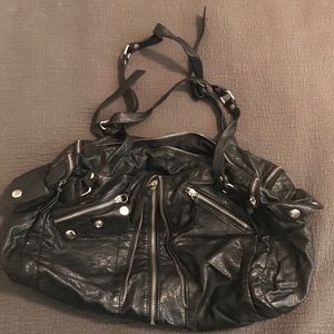 Black converse shoulder bag with zipper accents